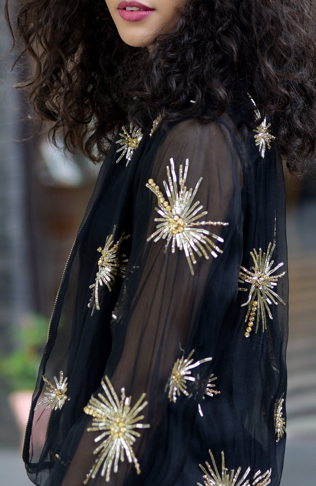 Black silk organza jacket with hand-embroidered starburst beads and sequins on tulle lining