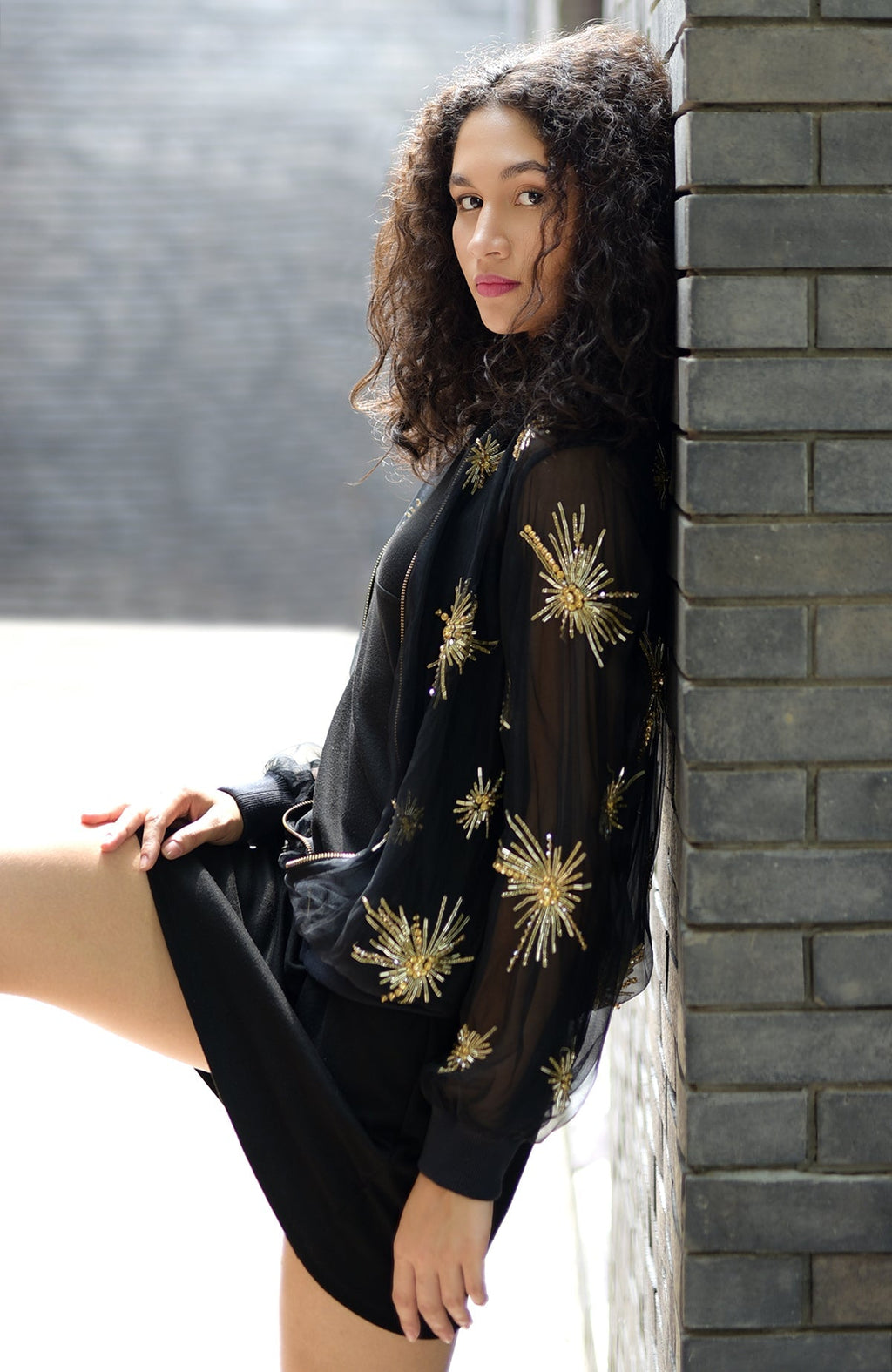 Black silk organza jacket with hand-embroidered starburst beads and sequins on front and sleeves