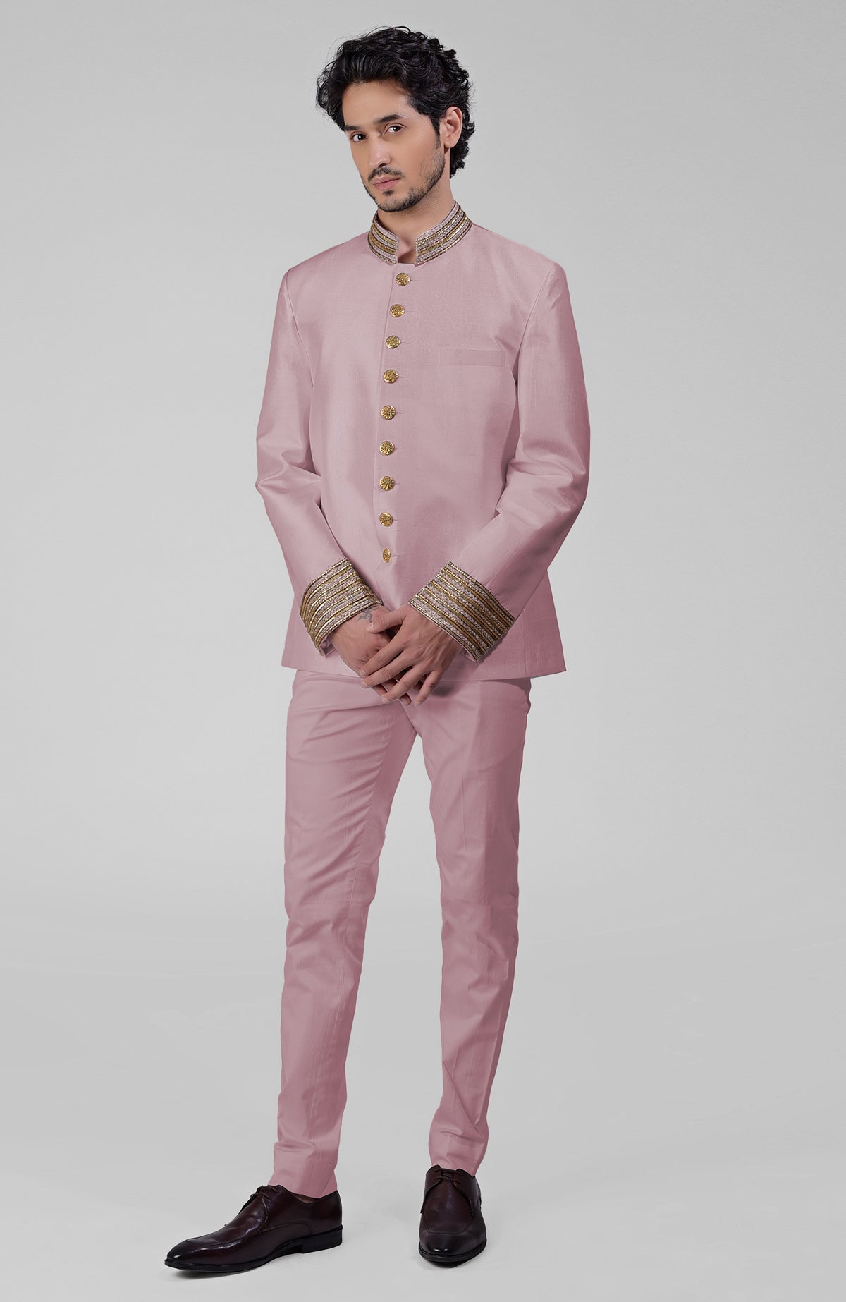Burnished lilac silk bandhgala jacket with gold zardozi embroidery and golden buttons paired with white pants