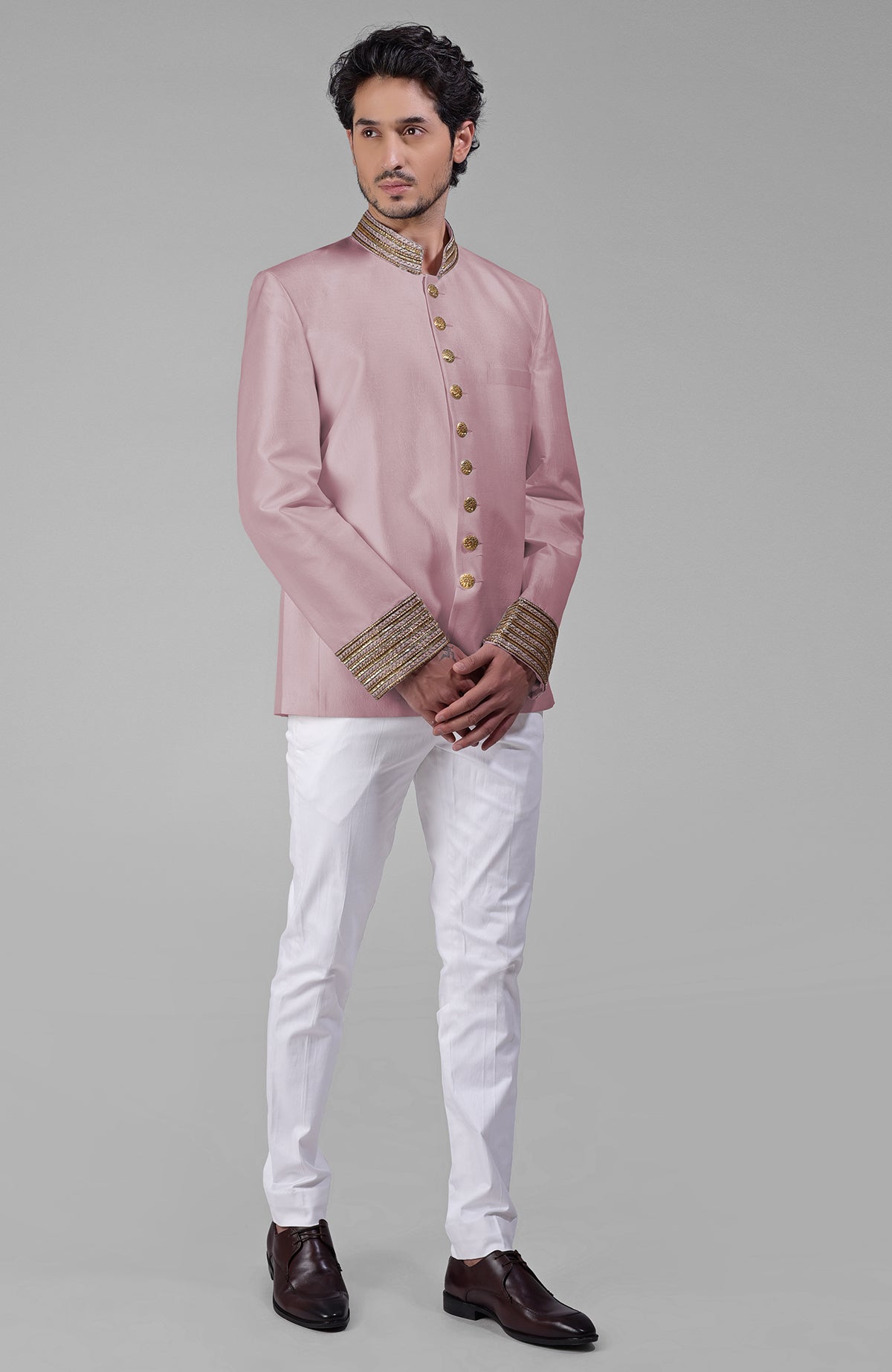 Navy blue silk bandhgala jacket with zardozi embroidery and matching tencil cotton pants.