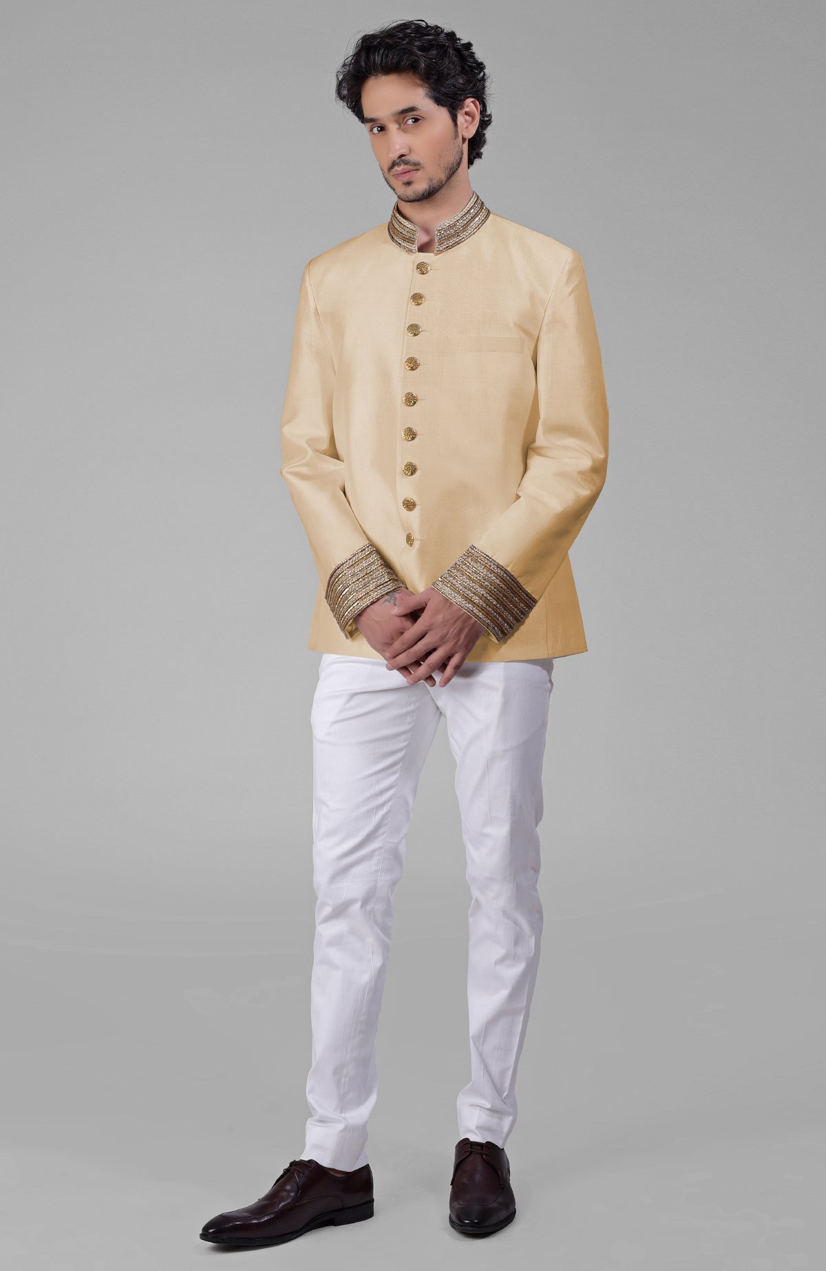 Burnished lilac raw silk bandhgala jacket with zardozi embroidery and matching tencil cotton pants.