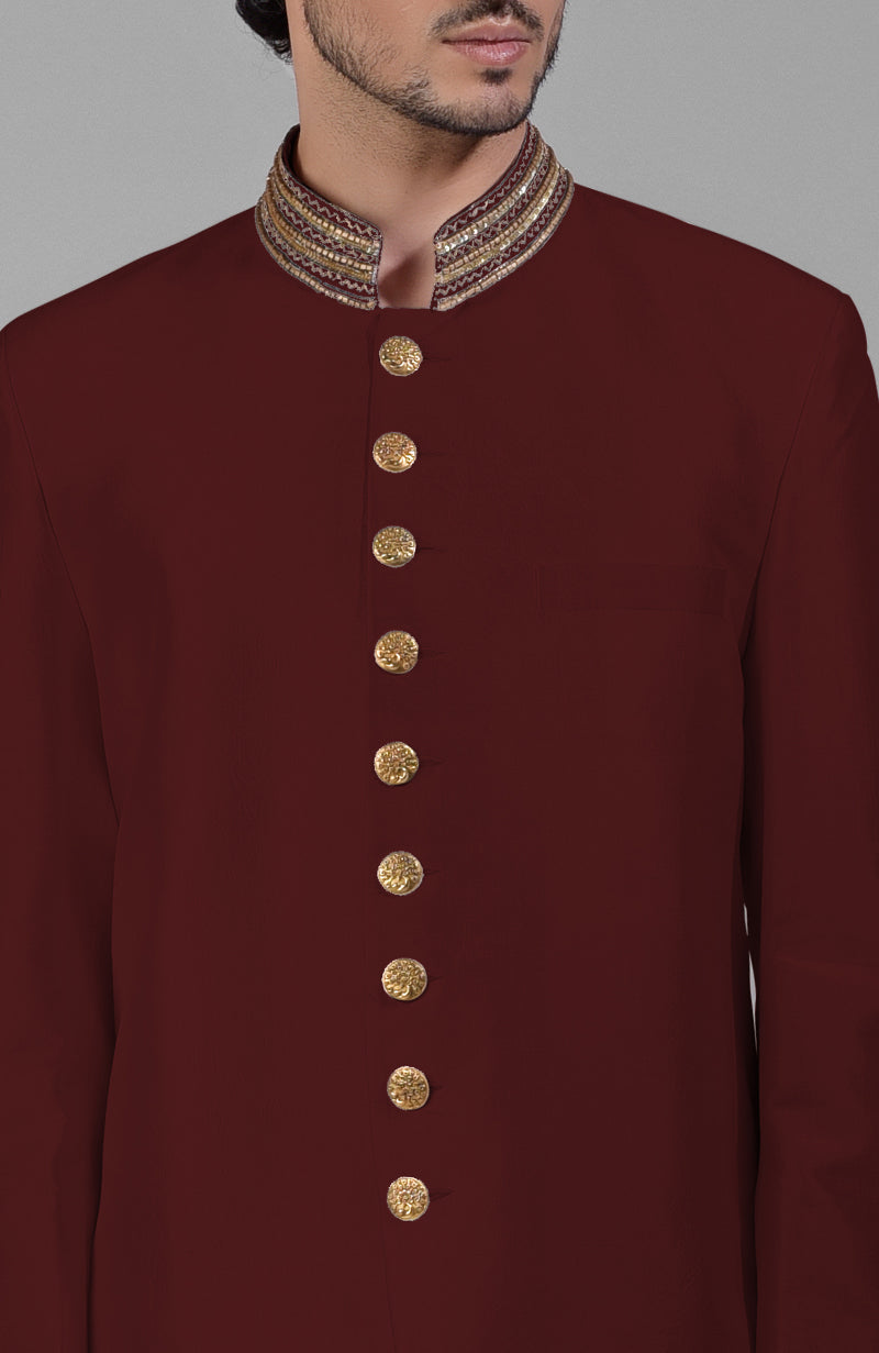 Maroon silk bandhgala jacket with zardozi embroidery and matching tencil cotton pants set