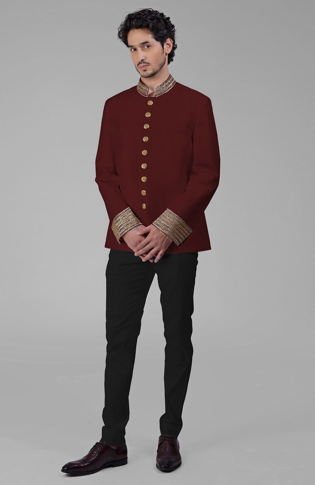 Ivory silk bandhgala jacket with gold zardozi embroidery and golden button closure paired with white pants