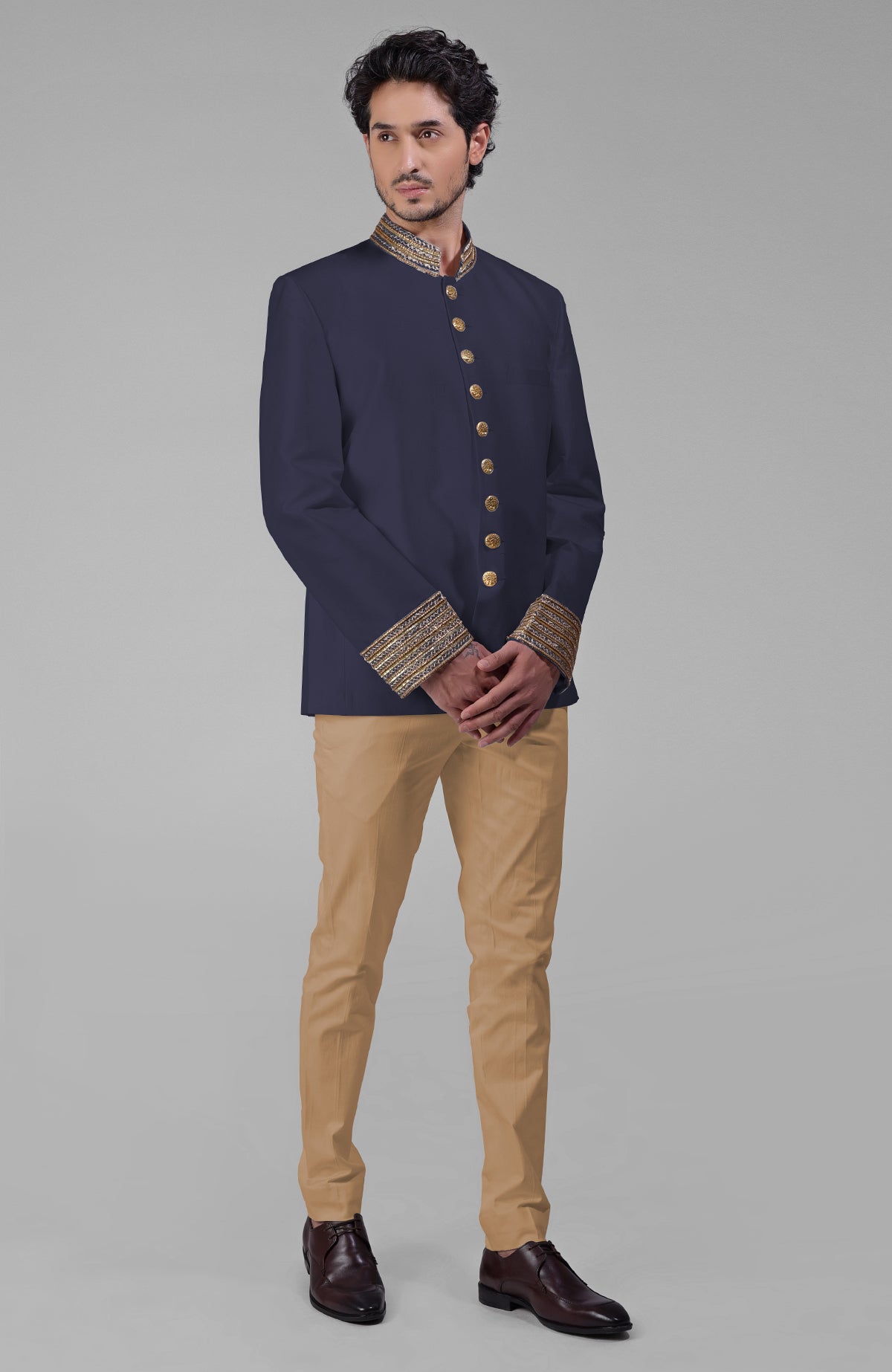 Burnished lilac silk bandhgala jacket with zardozi embroidery and matching tencil cotton pants.