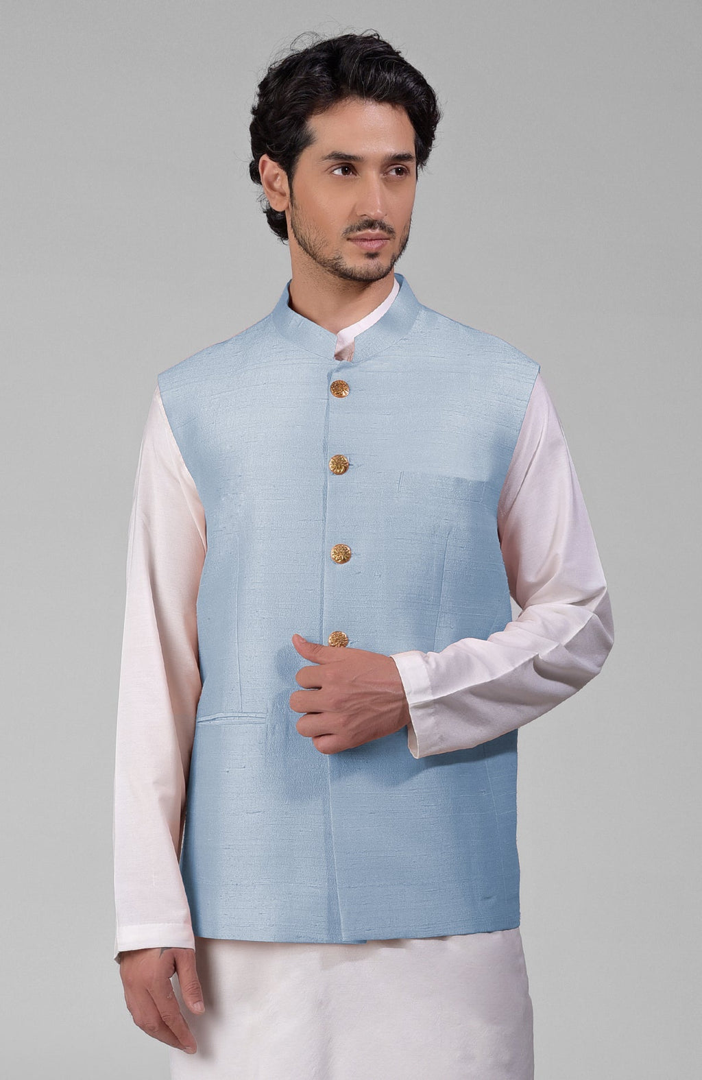 Dusty blue pure raw silk waistcoat bandi jacket with gold peacock emblem buttons and clean lines