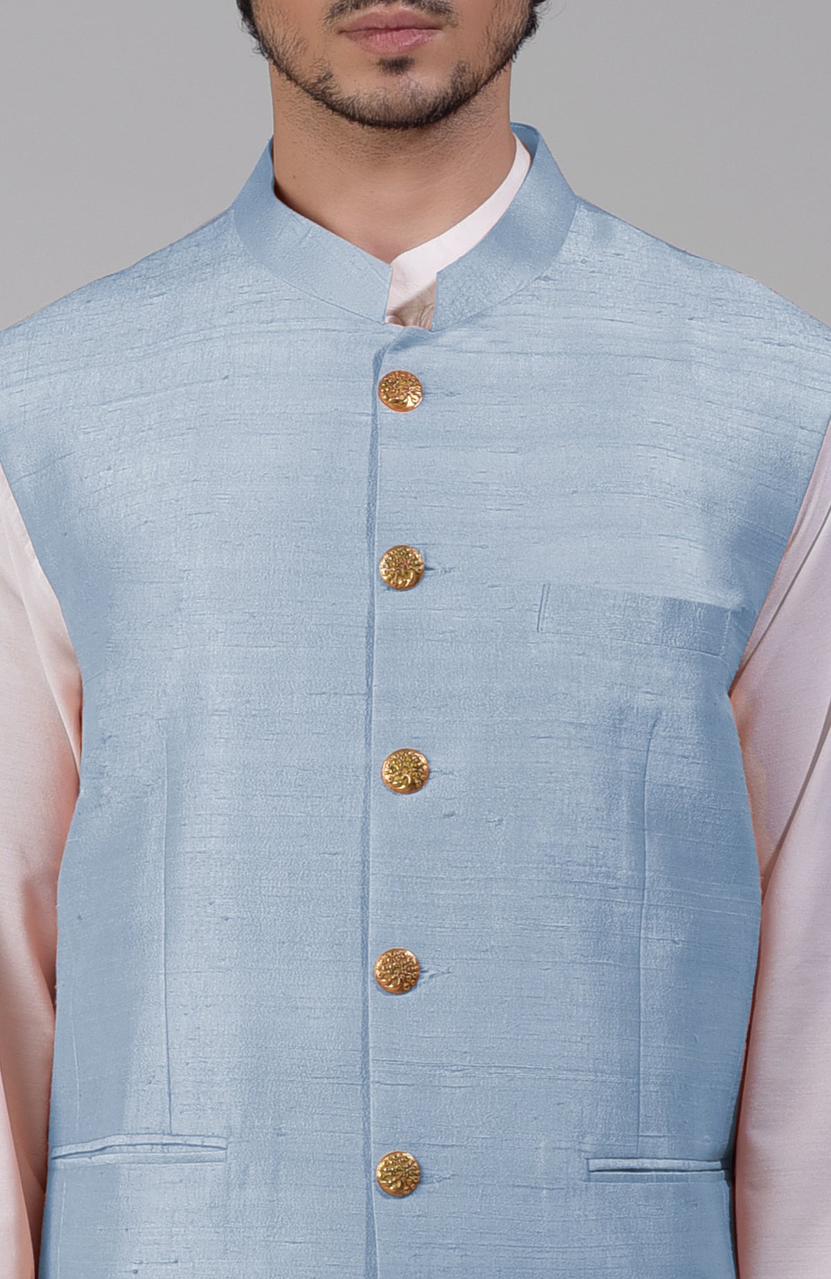 Dusty blue pure raw silk waistcoat bandi jacket with gold peacock emblem buttons and clean lines