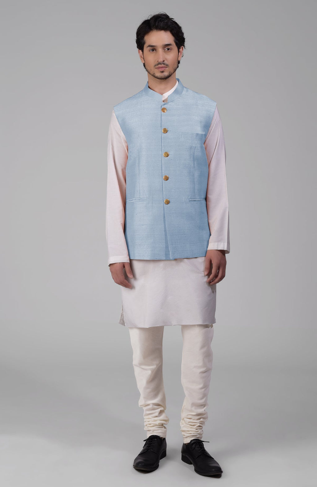 Dusty blue pure raw silk waistcoat bandi jacket with gold peacock emblem buttons and clean lines