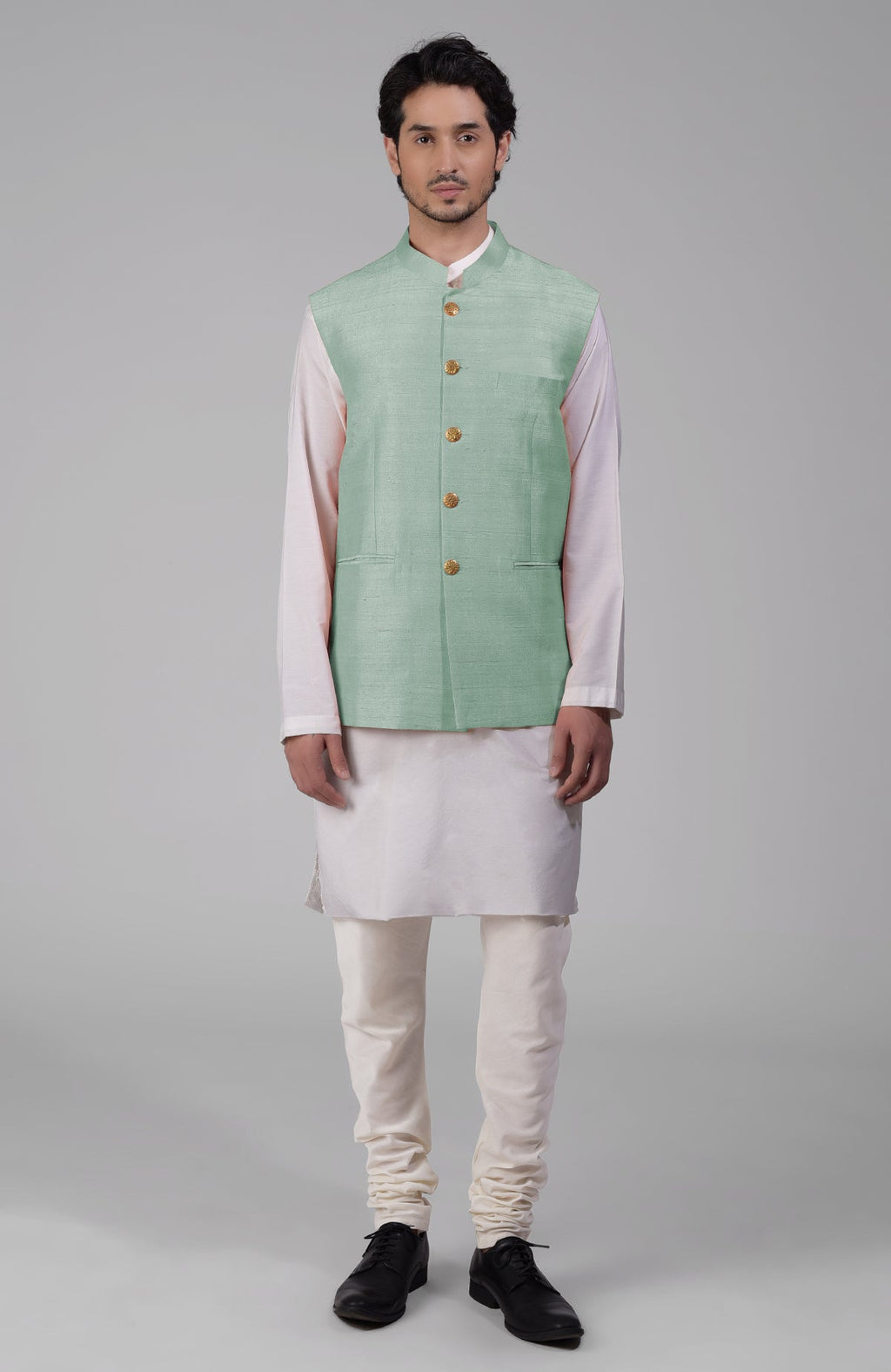 Gossamer green pure raw silk waistcoat bandi jacket with gold peacock button closure