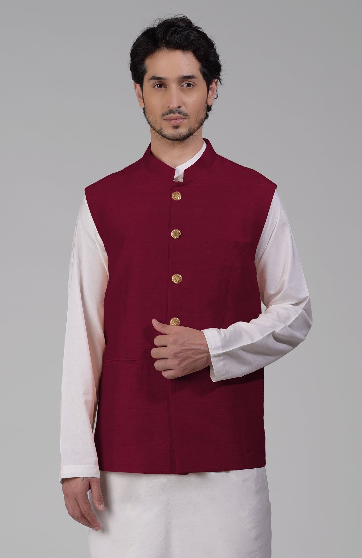 Red pure raw silk waistcoat bandi jacket with gold peacock emblem buttons and clean lines