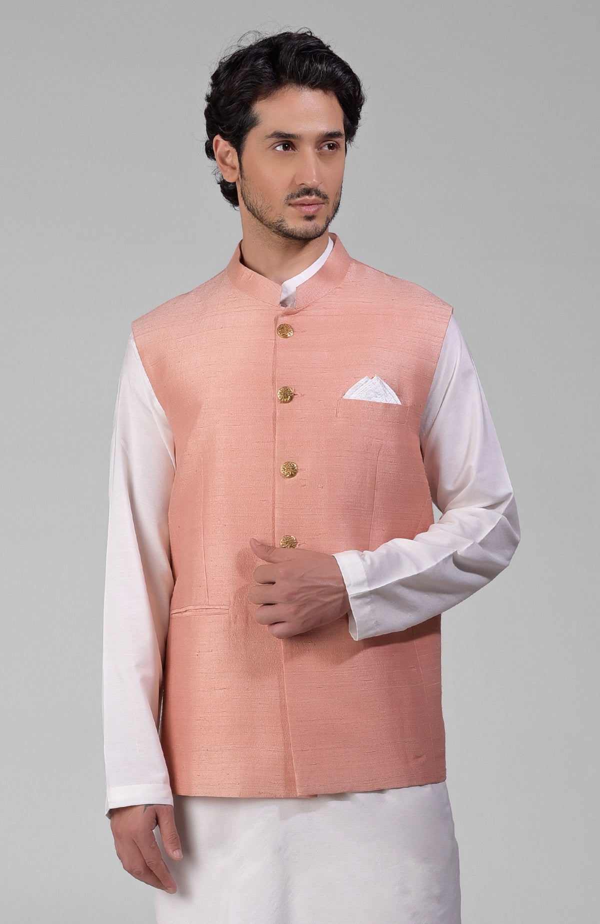 Peach pure raw silk waistcoat bandi jacket with golden buttons and a pocket square.