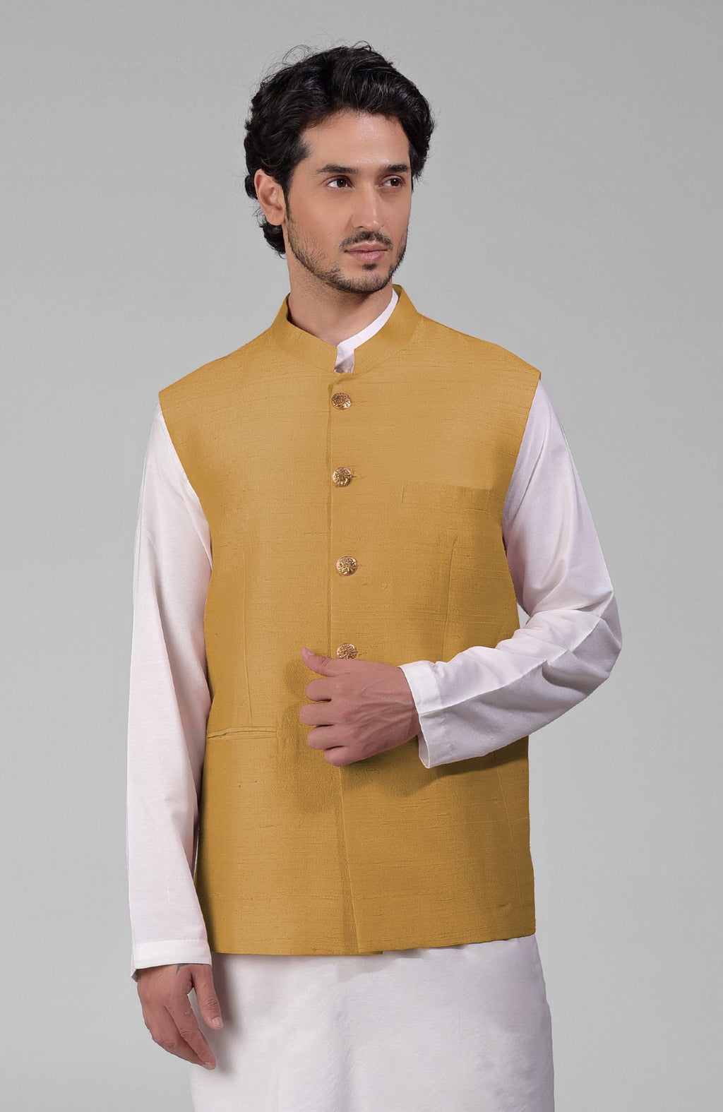 Gold pure raw silk waistcoat bandi jacket with gold peacock emblem buttons and clean lines