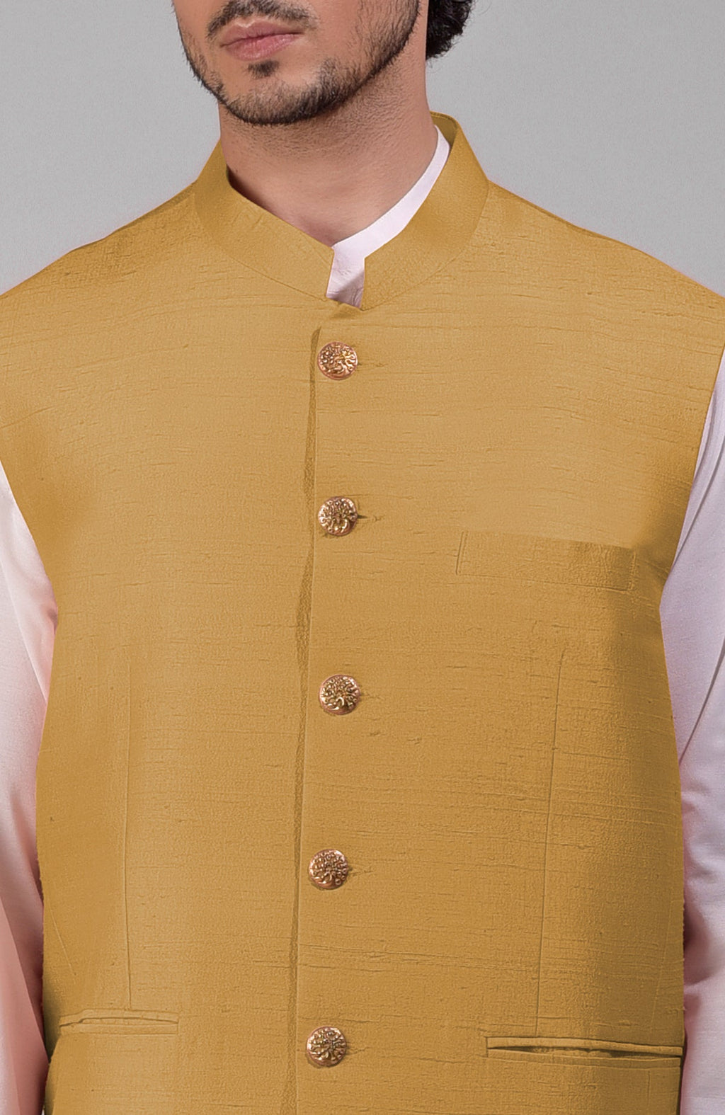 Gold pure raw silk waistcoat bandi jacket with gold peacock emblem buttons and clean lines