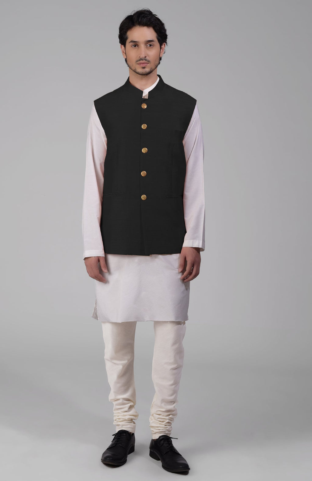 Black pure raw silk waistcoat bandi jacket with gold peacock emblem buttons and clean lines