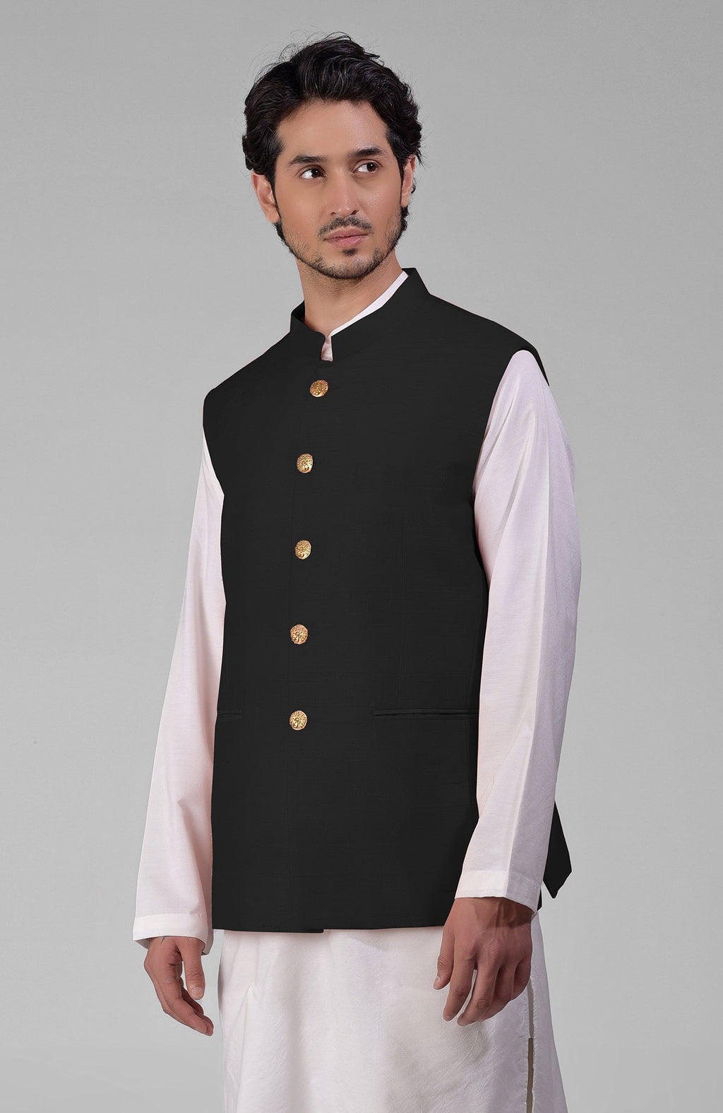 Black pure raw silk waistcoat bandi jacket with gold peacock emblem buttons and clean lines