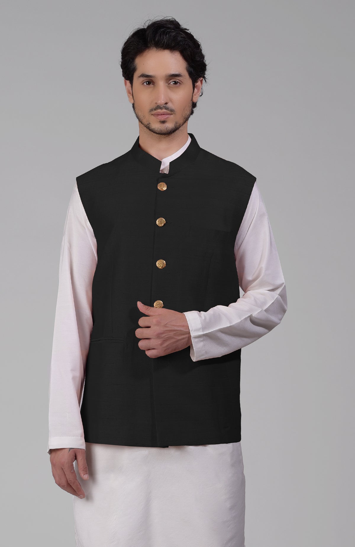 Black pure raw silk waistcoat bandi jacket with gold peacock emblem buttons and clean lines