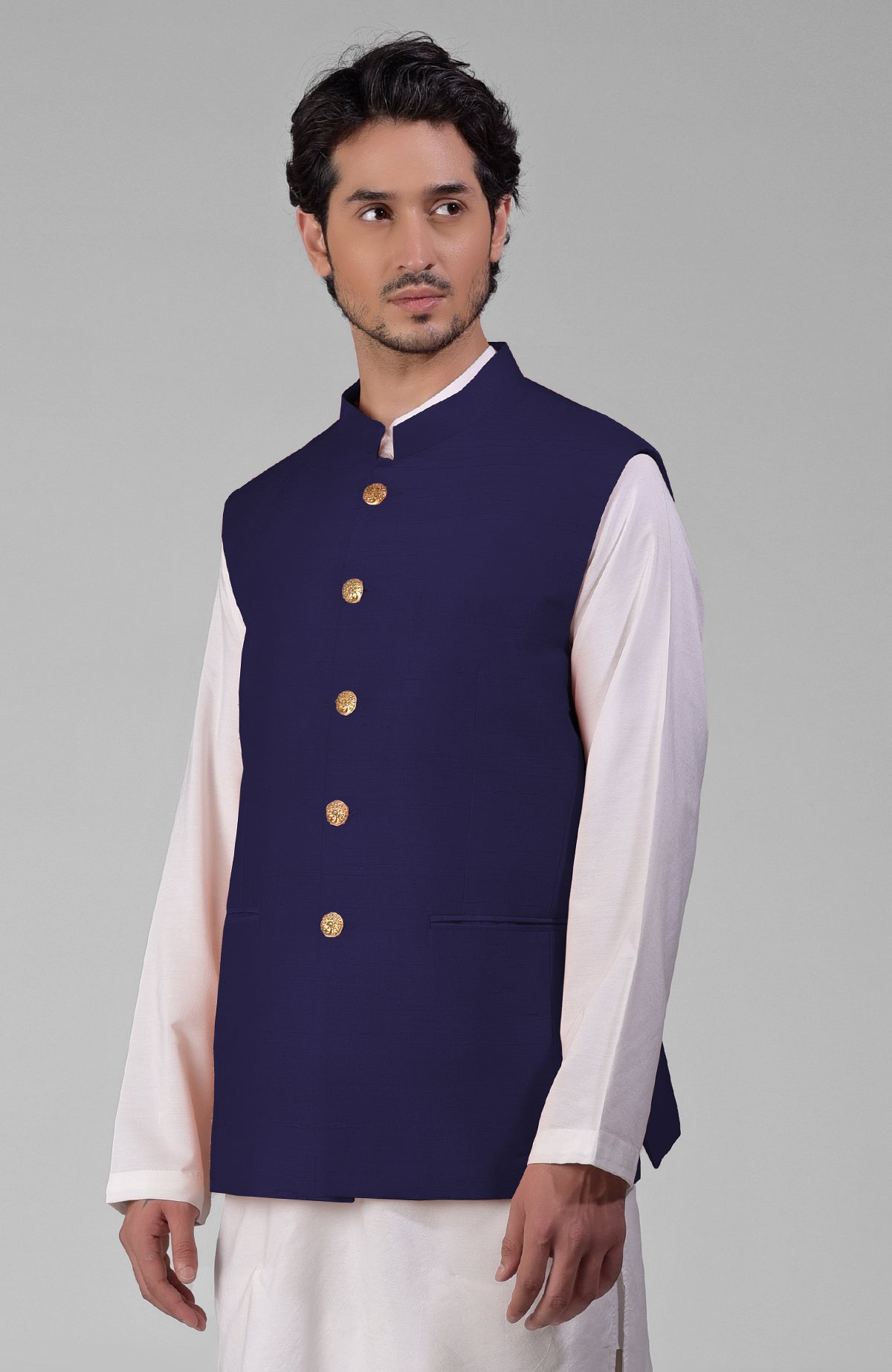 Ink blue pure raw silk waistcoat bandi jacket with gold peacock emblem buttons and clean lines