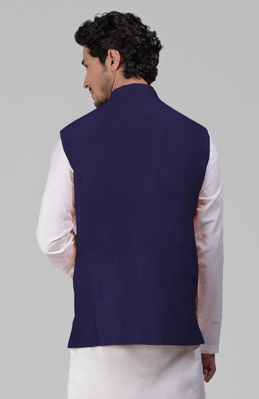 Ink blue pure raw silk waistcoat bandi jacket with gold peacock emblem buttons and clean lines
