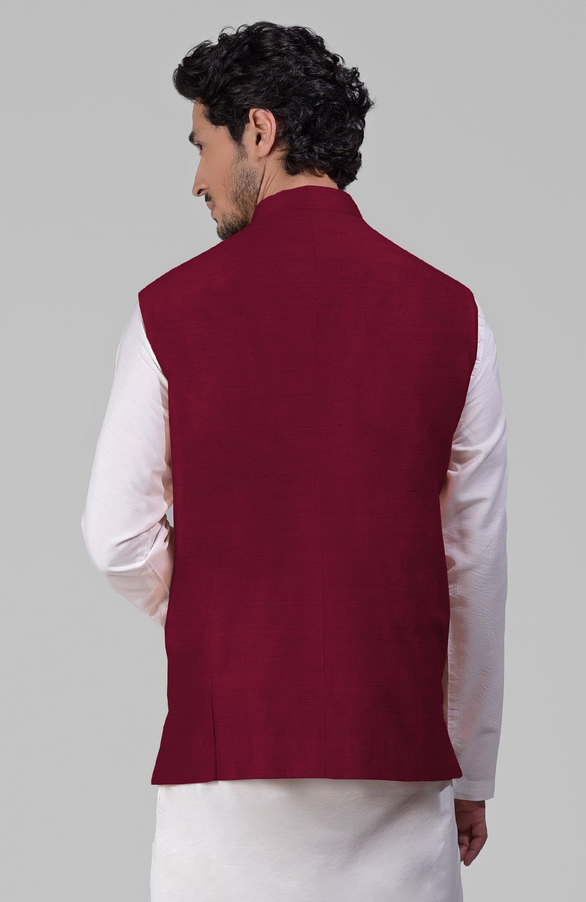 Maroon pure raw silk waistcoat bandi jacket with gold peacock emblem buttons and clean lines
