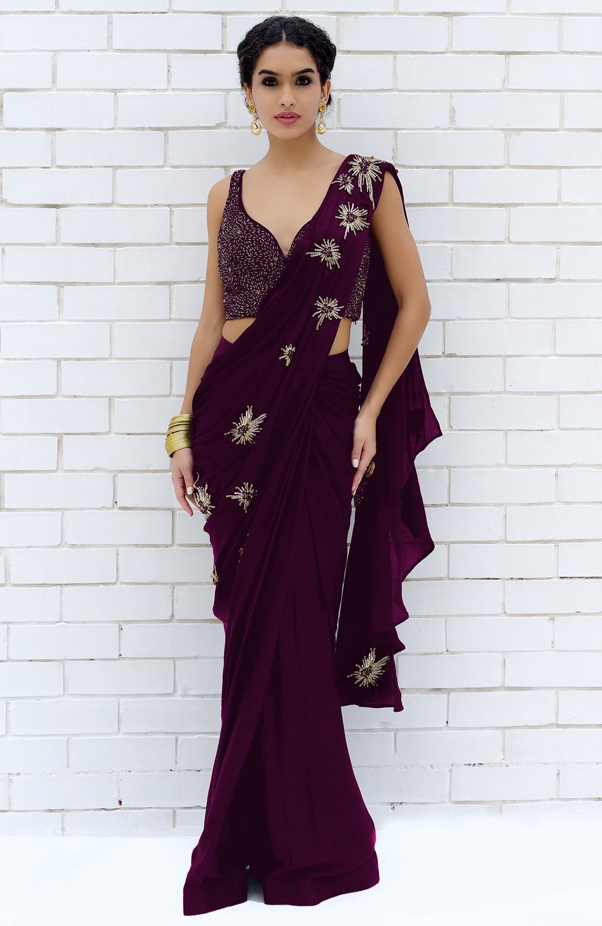 Plum starburst beads and sequin hand-embroidered saree with blouse.