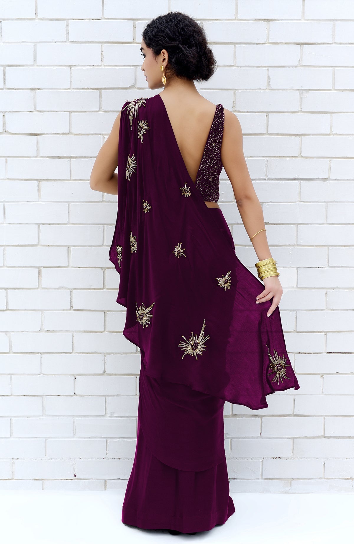 Plum starburst beads and sequin hand-embroidered saree with blouse.