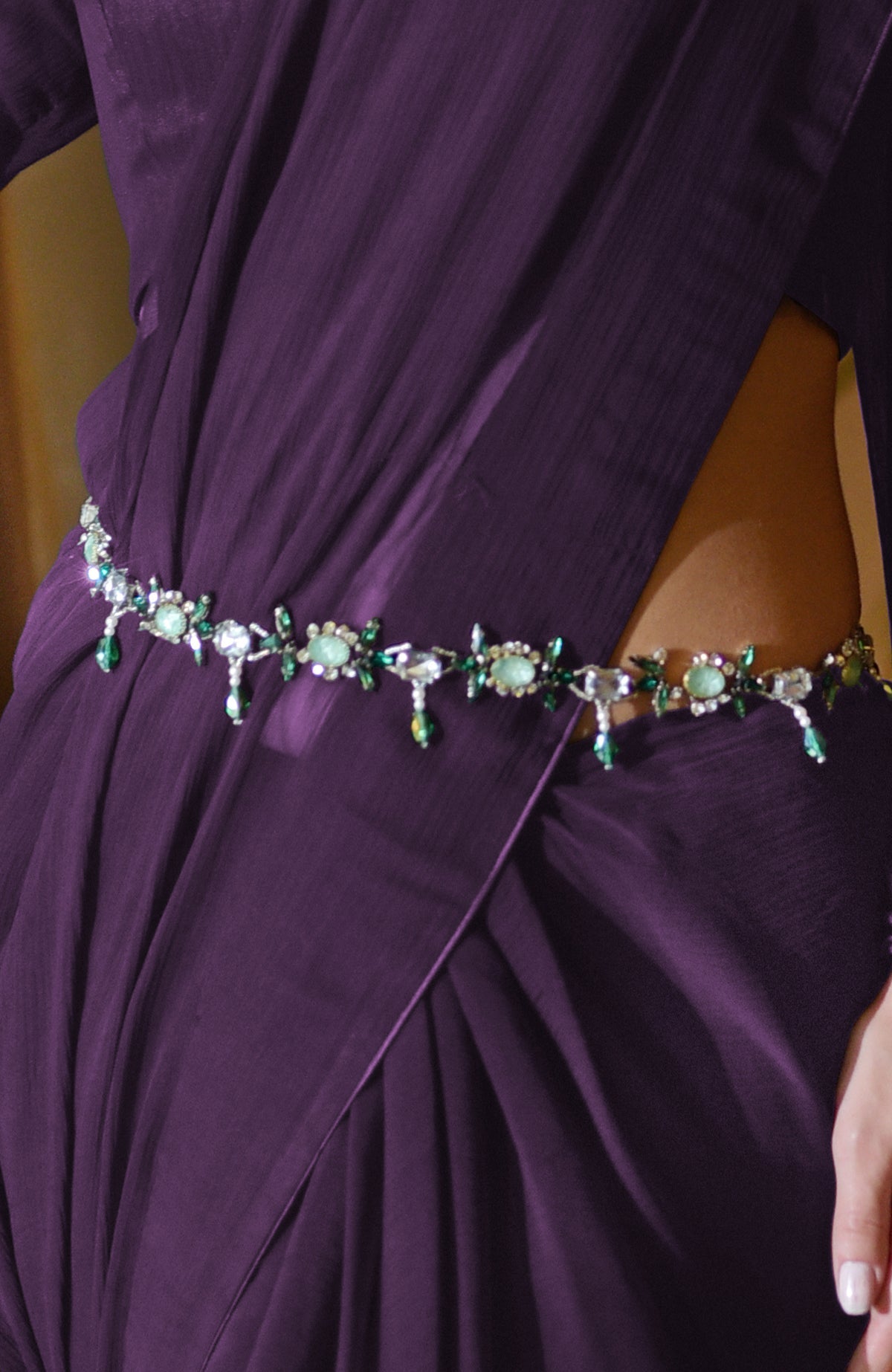 Classic plum chiffon saree with pre-stitched design and blouse with V neckline and sheer sleeves