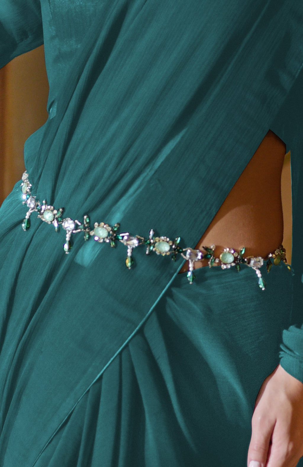 Classic teal chiffon saree with pre-stitched design and blouse featuring V neckline and sheer sleeves