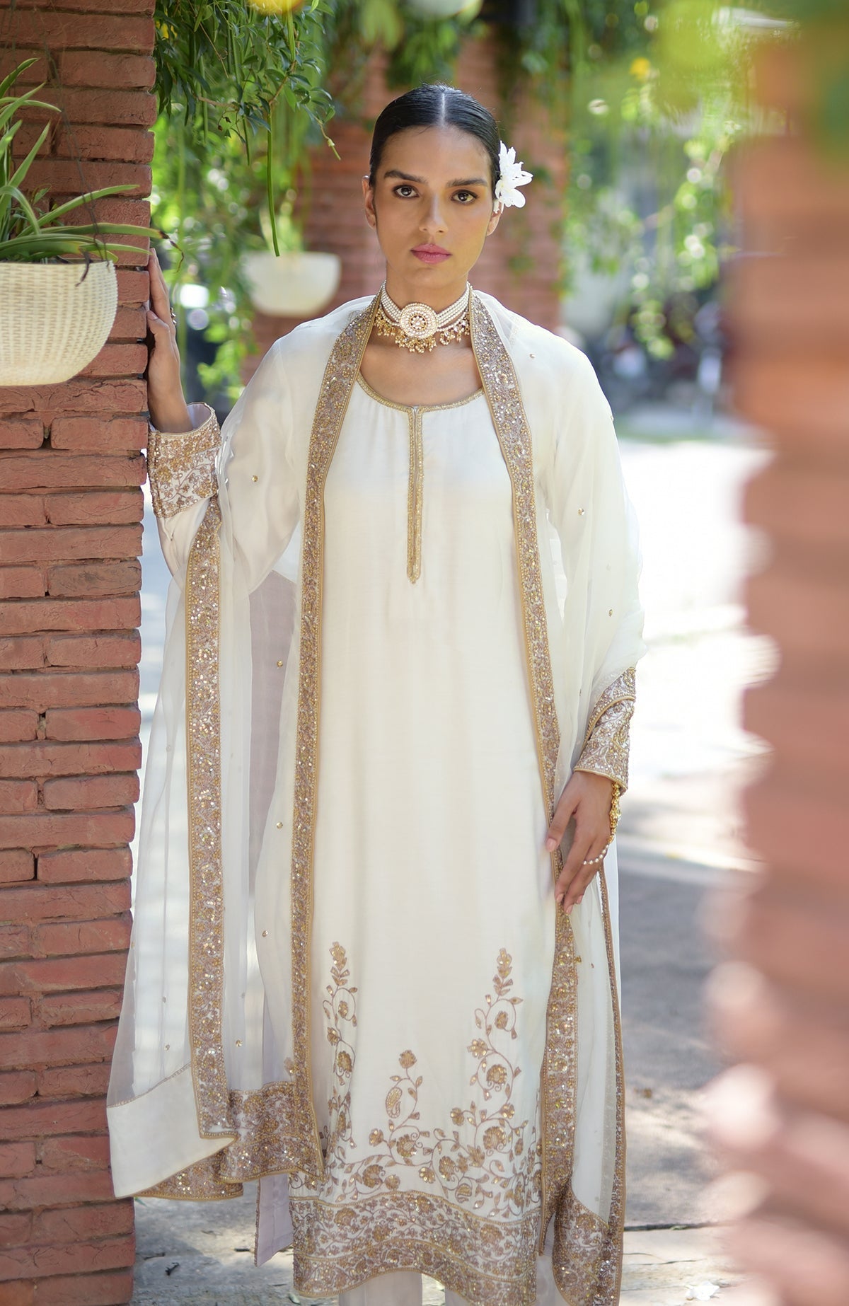 Ivory-gold marori, beads, and sequin hand-embroidered kurta set.