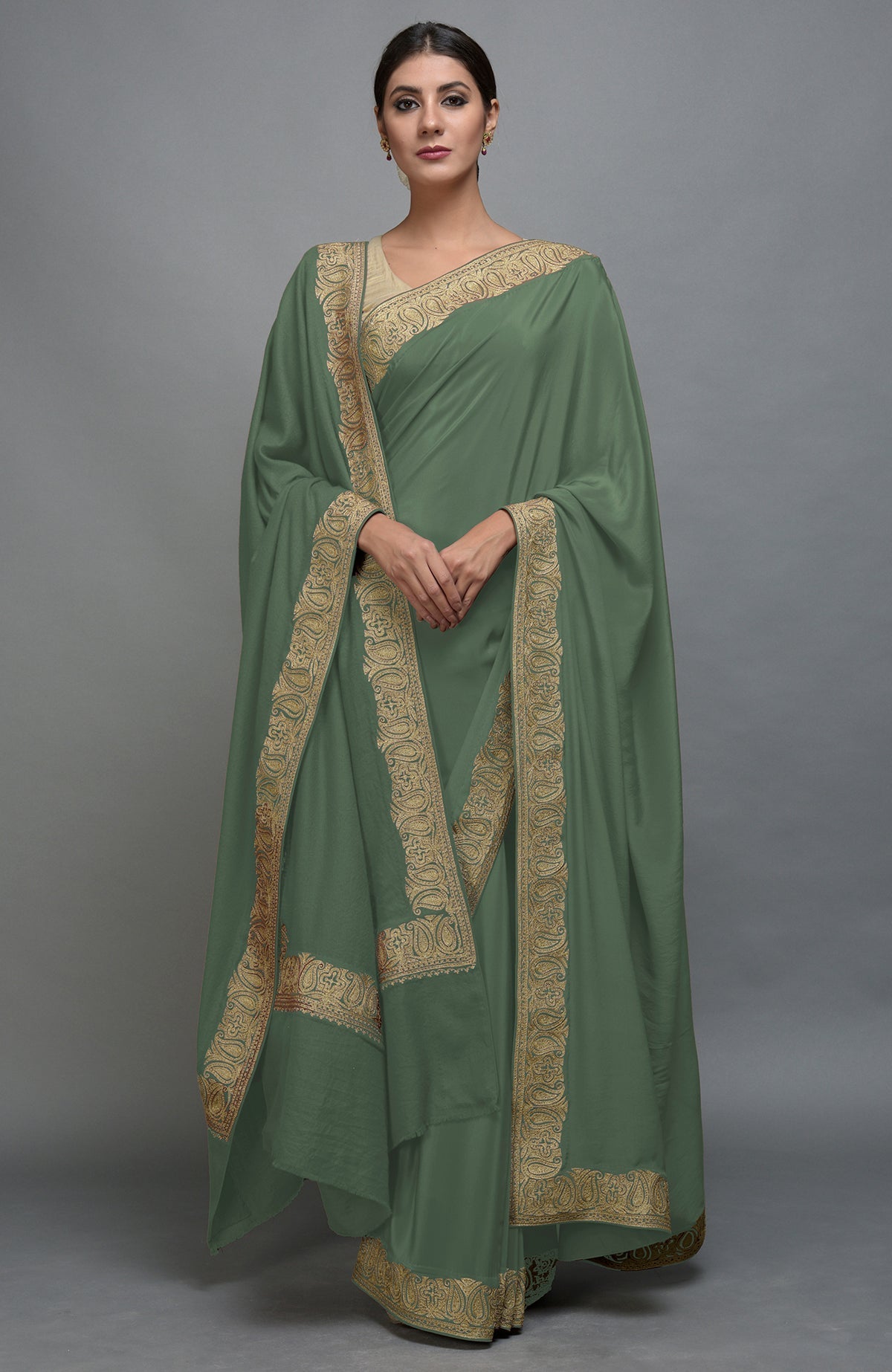 Dark jade Kashmiri Tilla Aari embroidered saree and Pashmina shawl set.