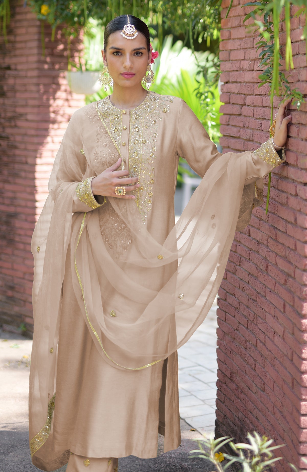 Beige kurta set with gold marori beads and sequin embroidery.