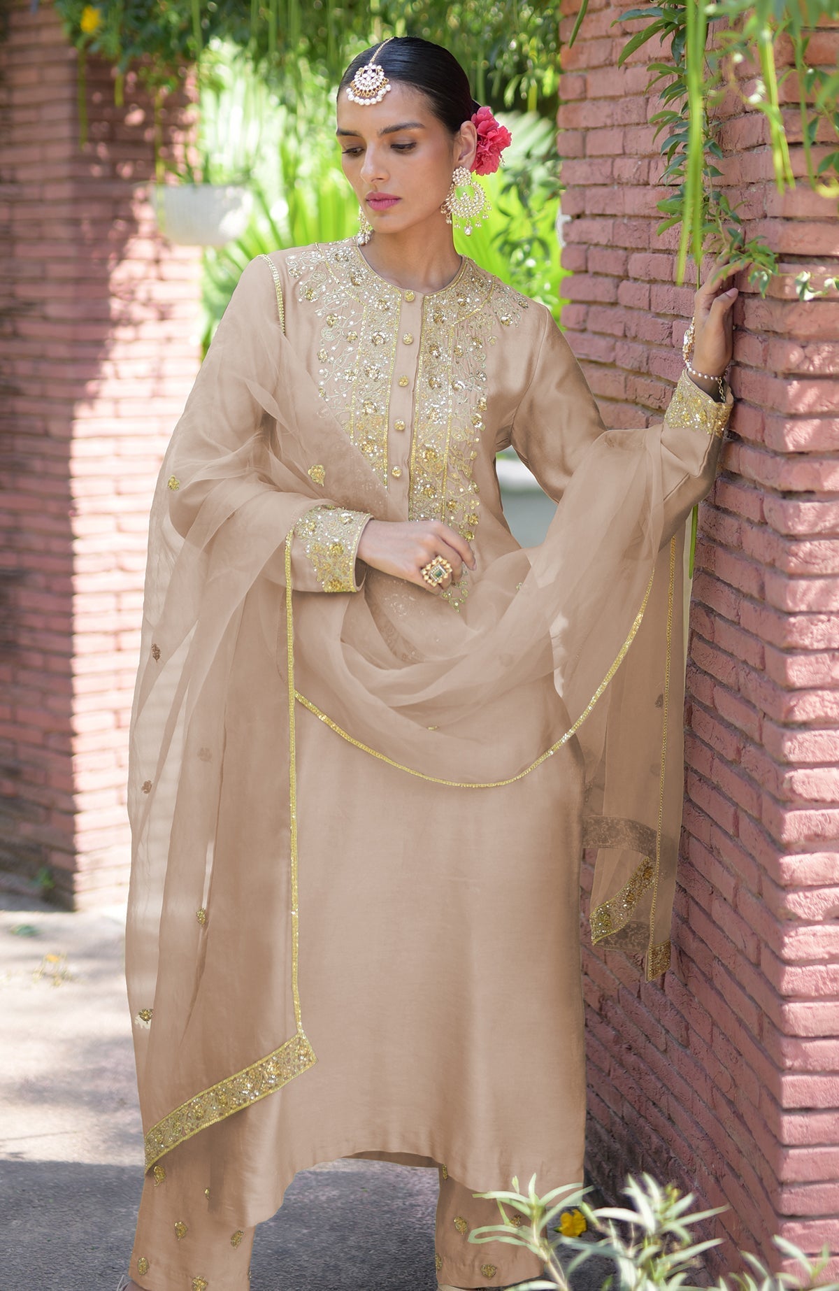 Beige kurta set with gold marori beads and sequin embroidery.