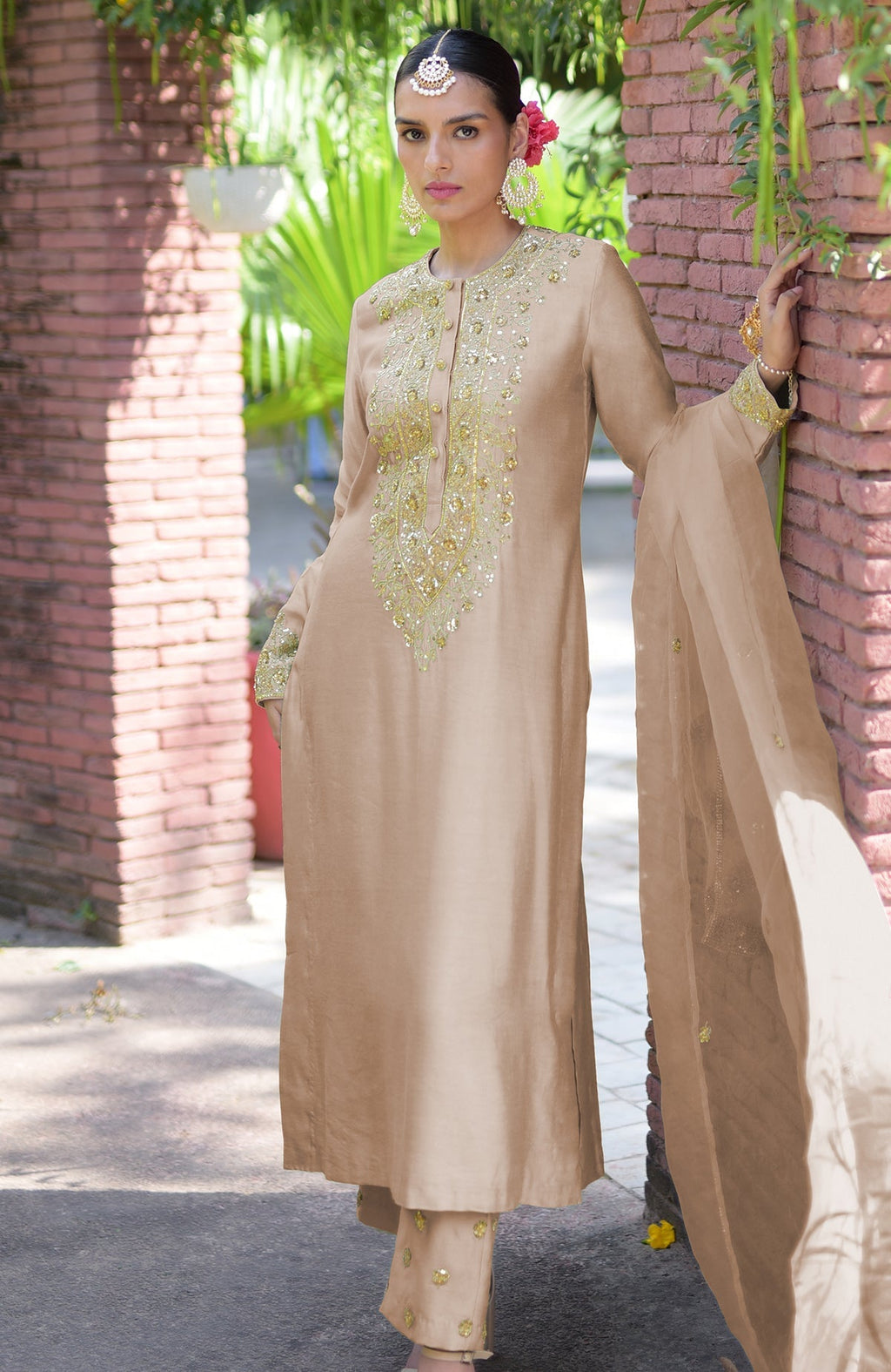 Beige kurta set with gold marori beads and sequin embroidery.