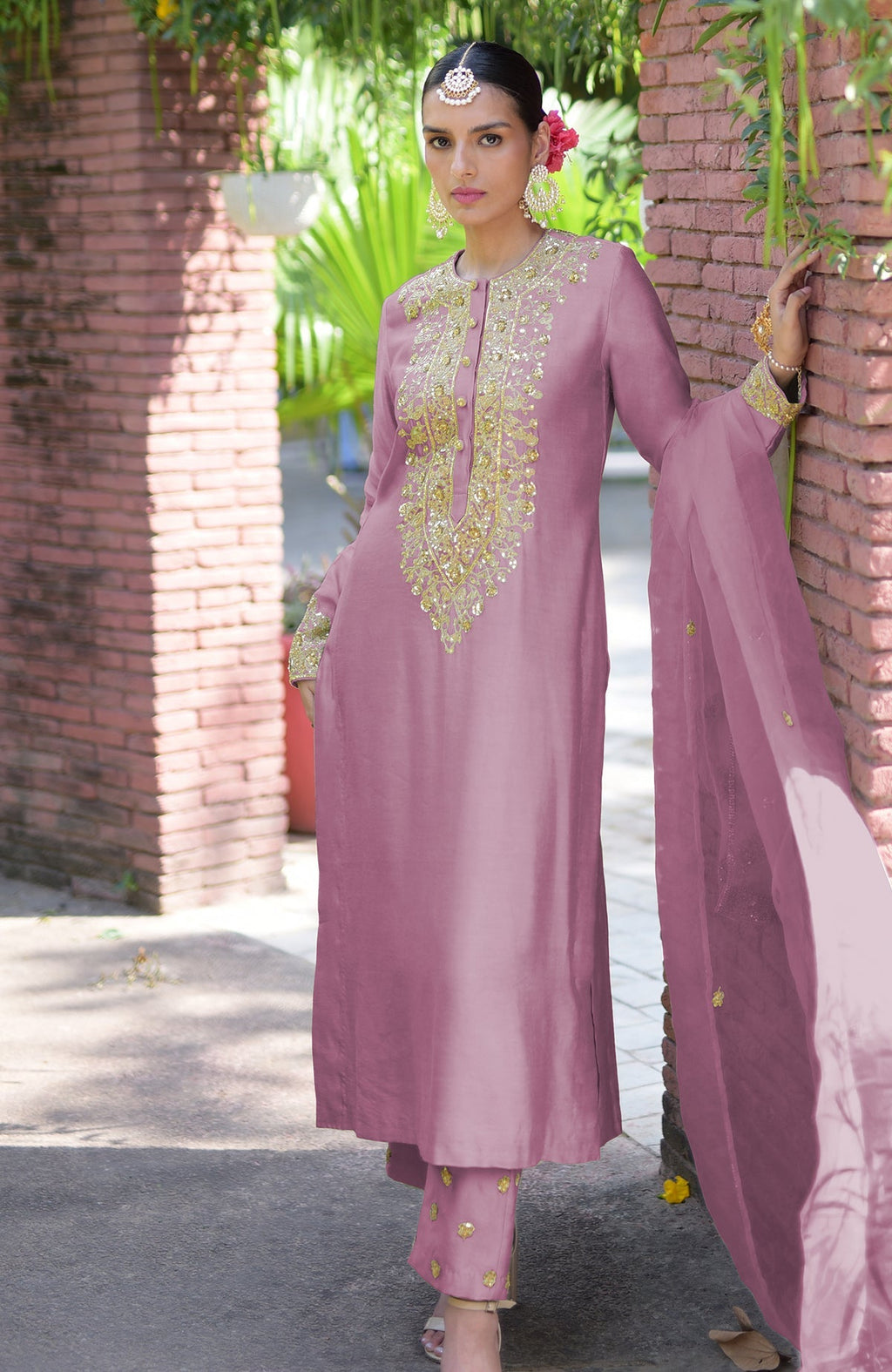 Mauve kurta set with gold marori beads and sequin embroidery.