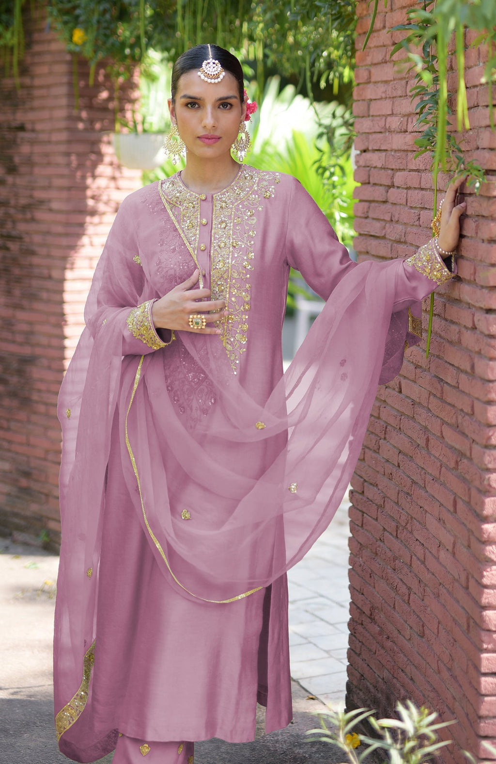 Mauve kurta set with gold marori beads and sequin embroidery.