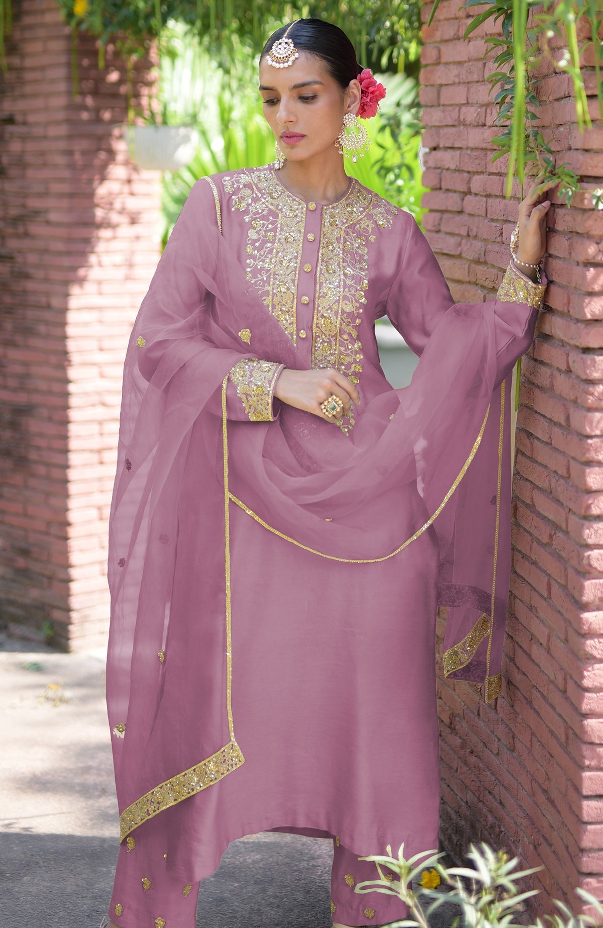 Mauve kurta set with gold marori beads and sequin embroidery.