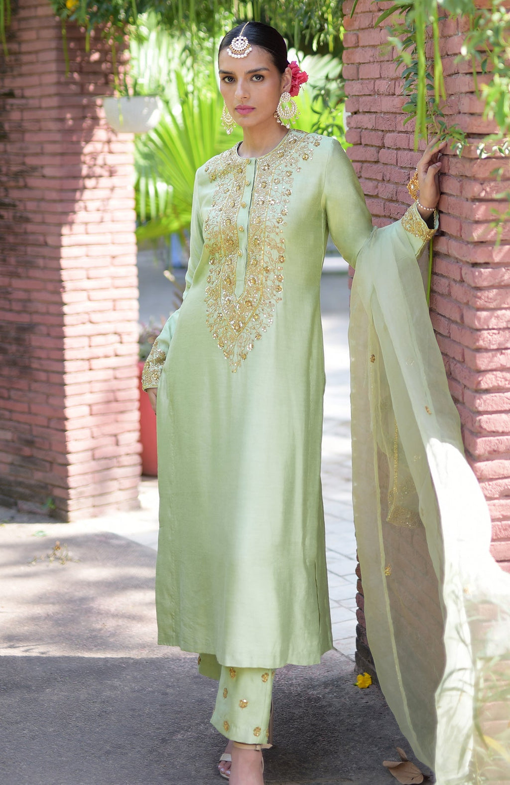 Pista green kurta set with gold marori beads and sequin hand embroidery.