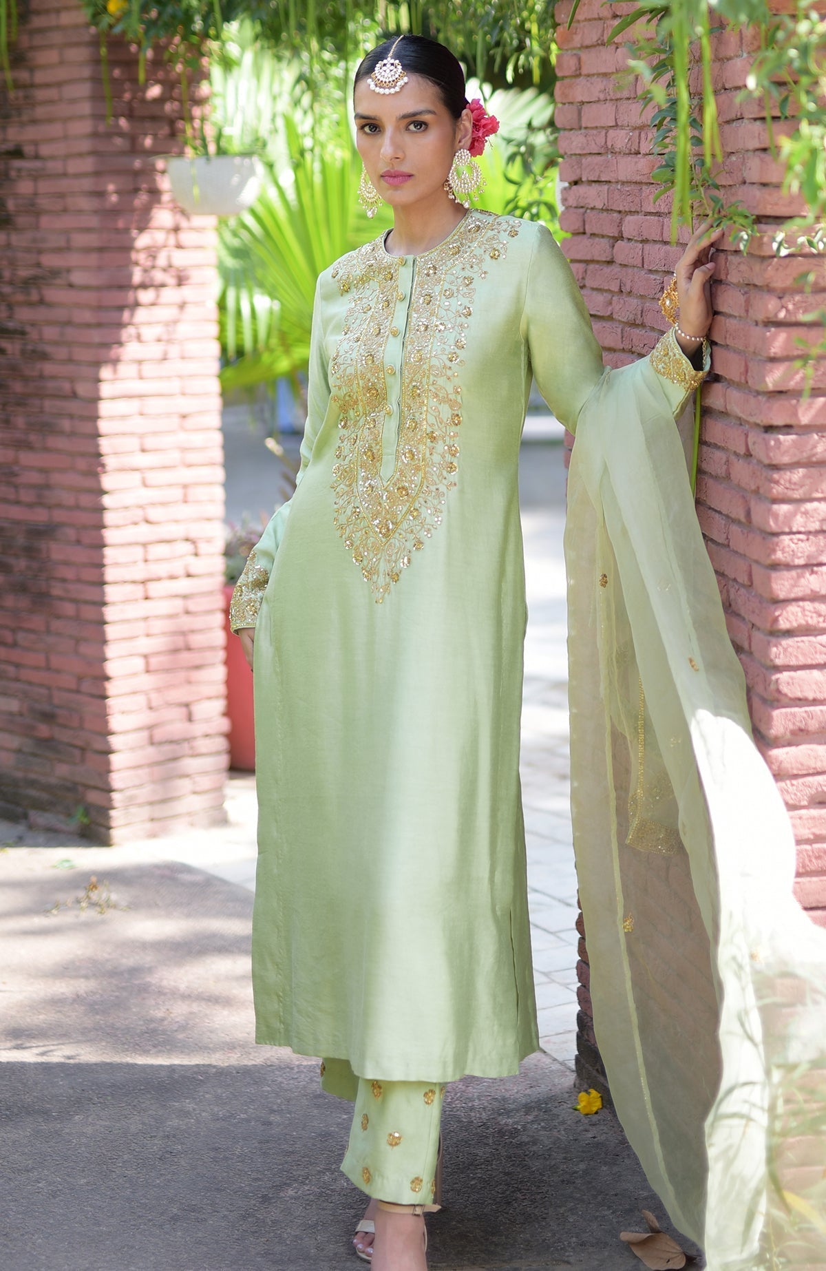 Pista green kurta set with gold marori beads and sequin hand embroidery.