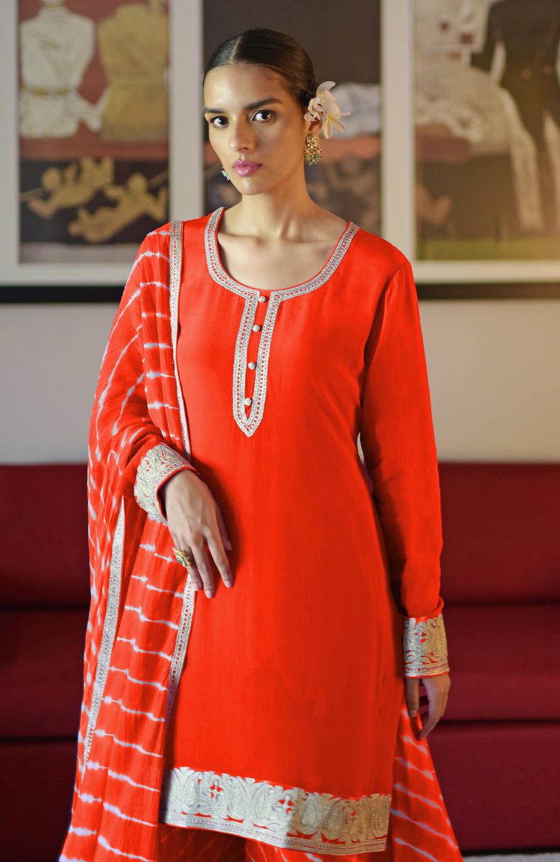 Tomato Red Leheriya Sharara Set with Kashmiri Tilla embroidery.