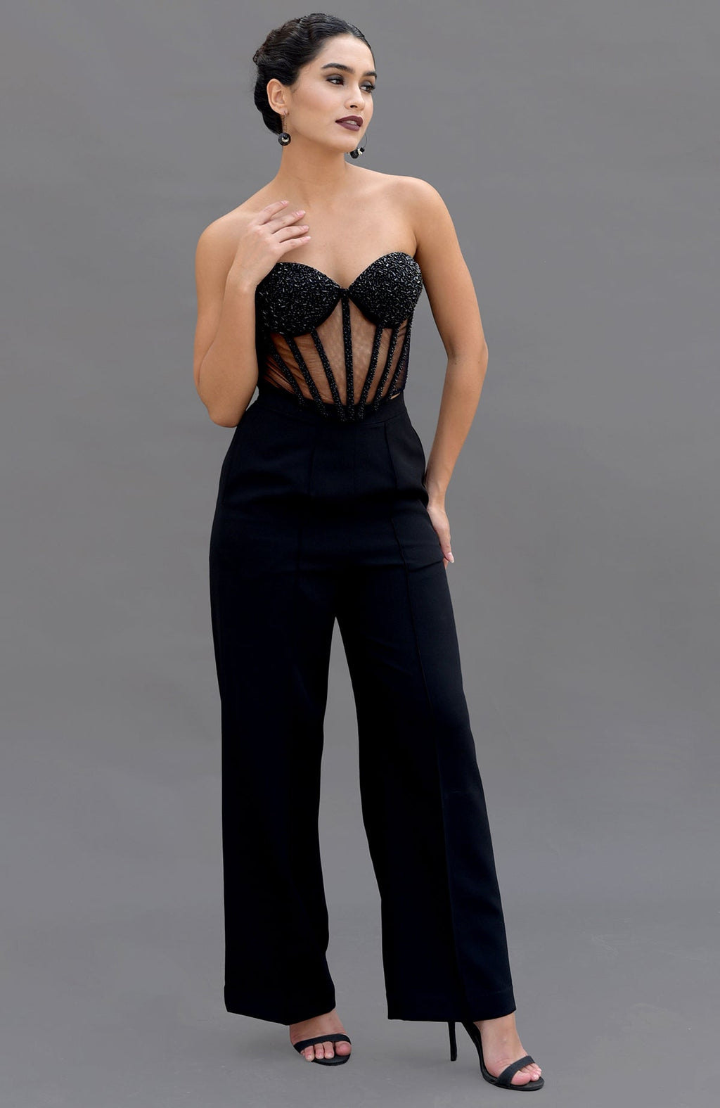 Elysian black hand-embroidered corset and pants set.