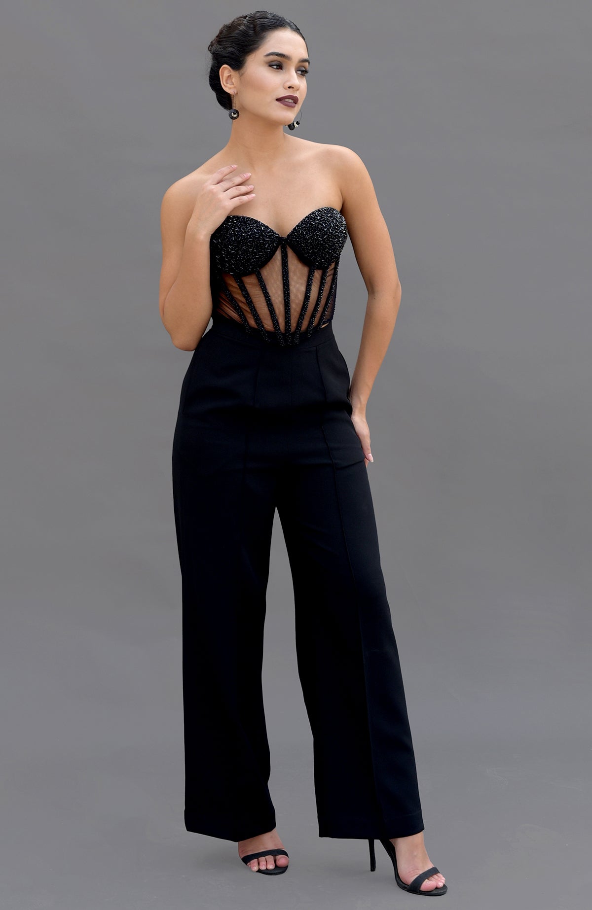 Elysian black hand-embroidered corset and pants set.