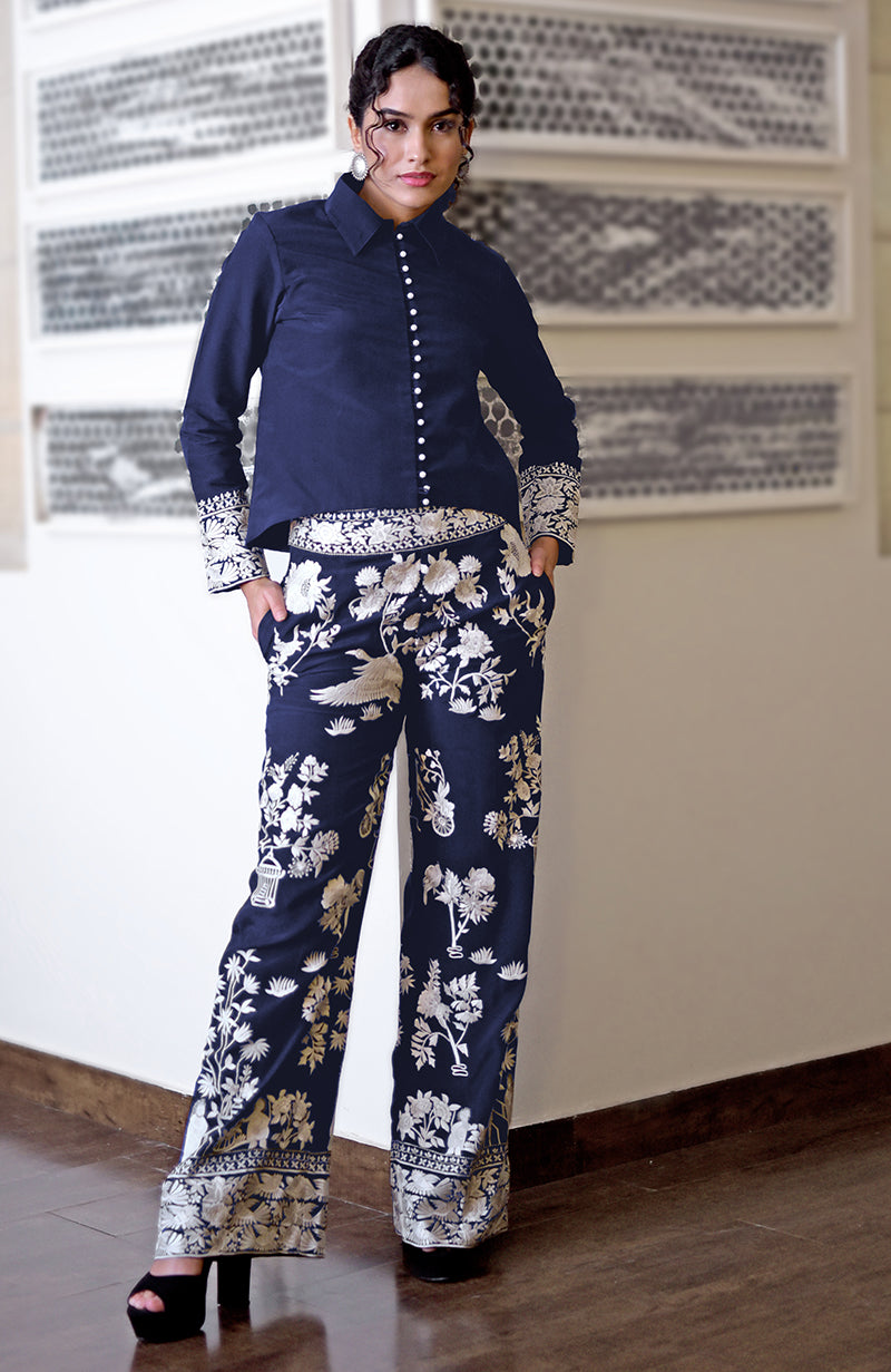 Navy blue Parsi Gara embroidered co-ord set with a short shirt and wide-leg pants.