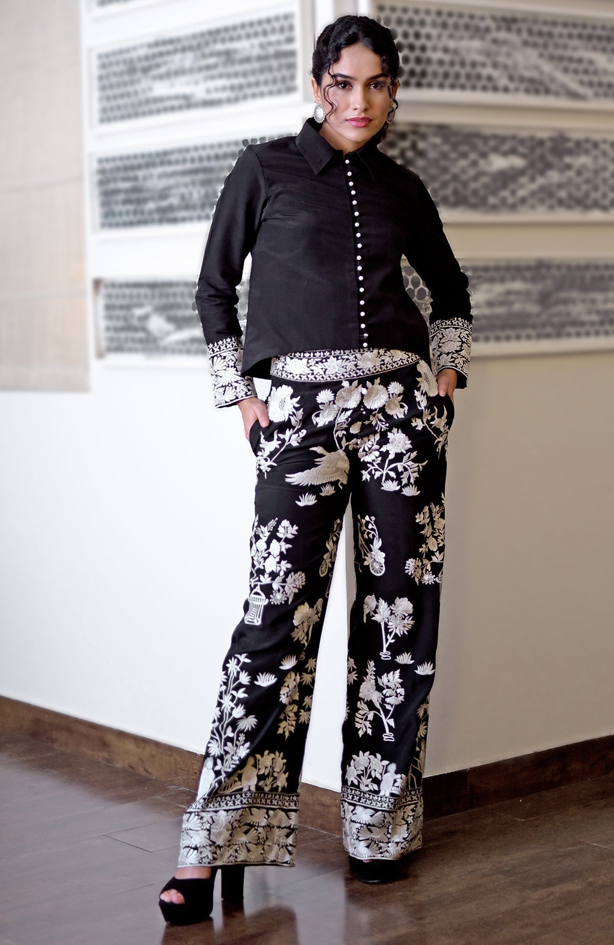 Black Parsi Gara embroidered co-ord set with a short shirt and wide-leg pants.