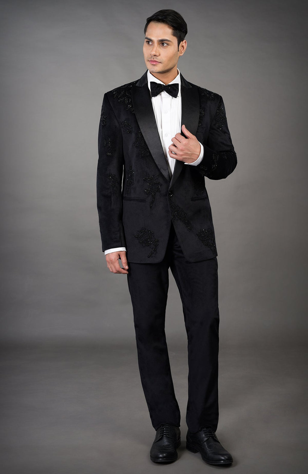 Black Moss Tuxedo Set with intricate hand embroidery and a satin peak lapel.