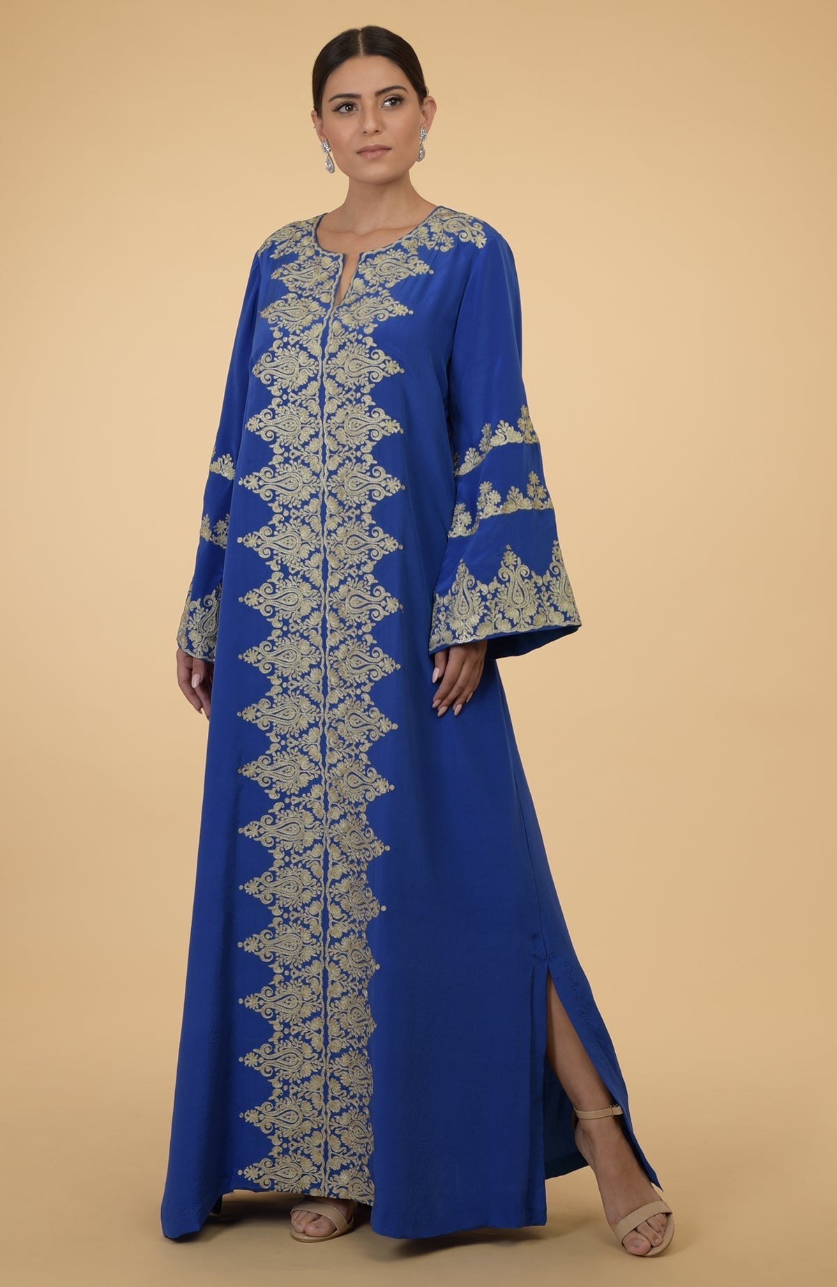 Cobalt blue kaftan with gold Kashmir embroidery, round neck, and bell sleeves.