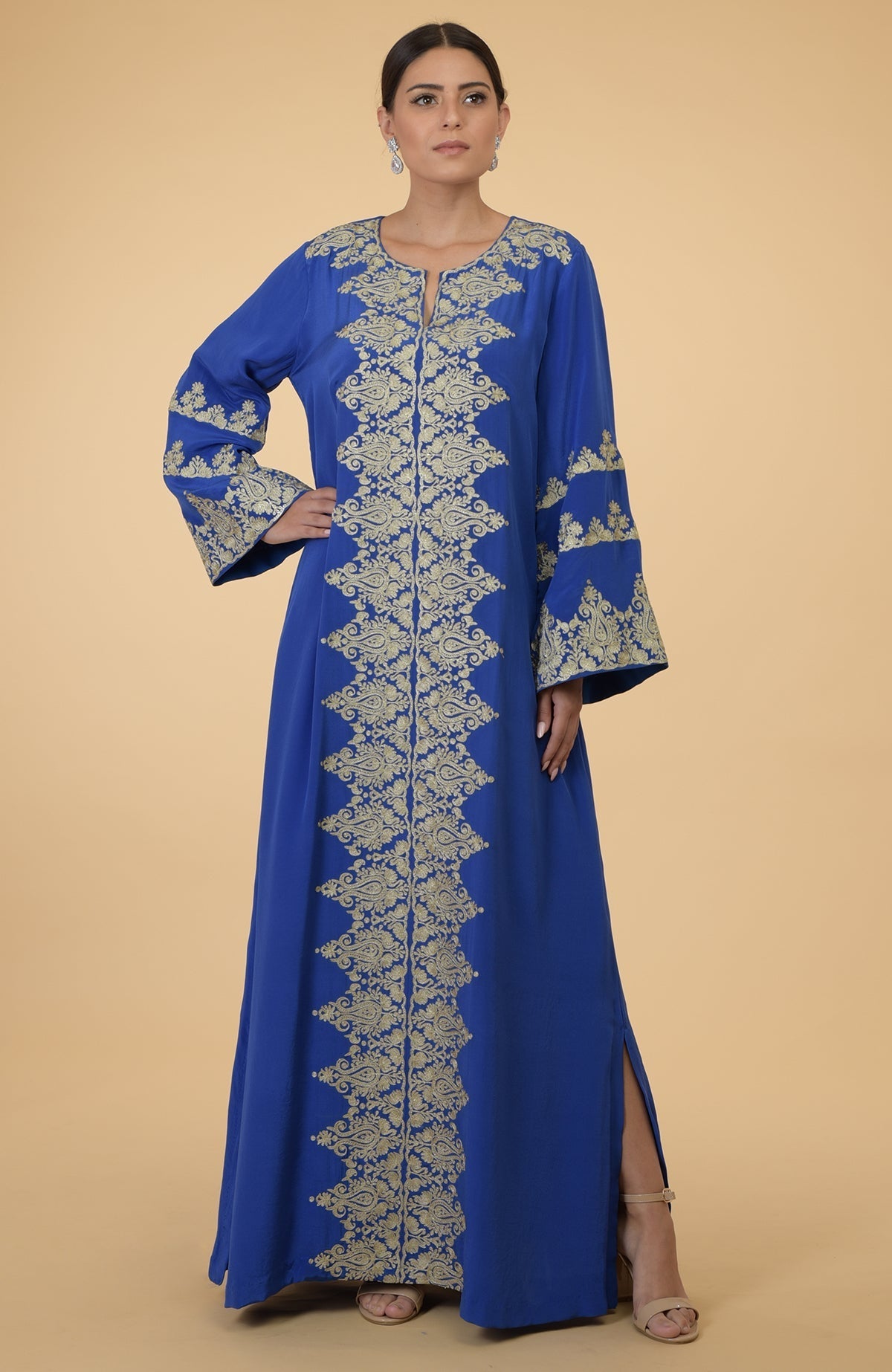 Cobalt blue kaftan with gold Kashmir embroidery, round neck, and bell sleeves.