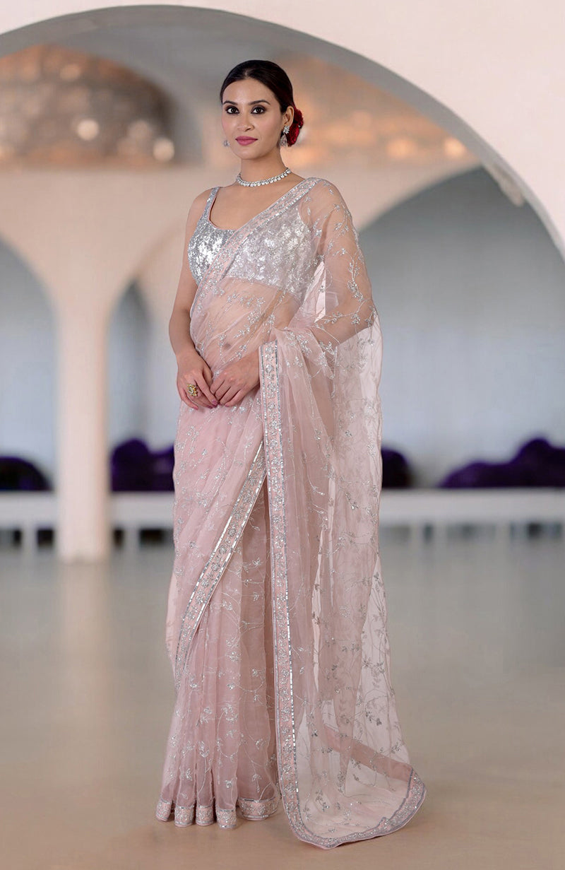 Oyster pink saree with silver beads and sequin zardozi hand embroidery.