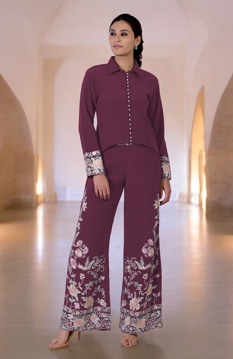 Yam Parsi Gara embroidered co-ord set with a high-low top and wide-leg pants.