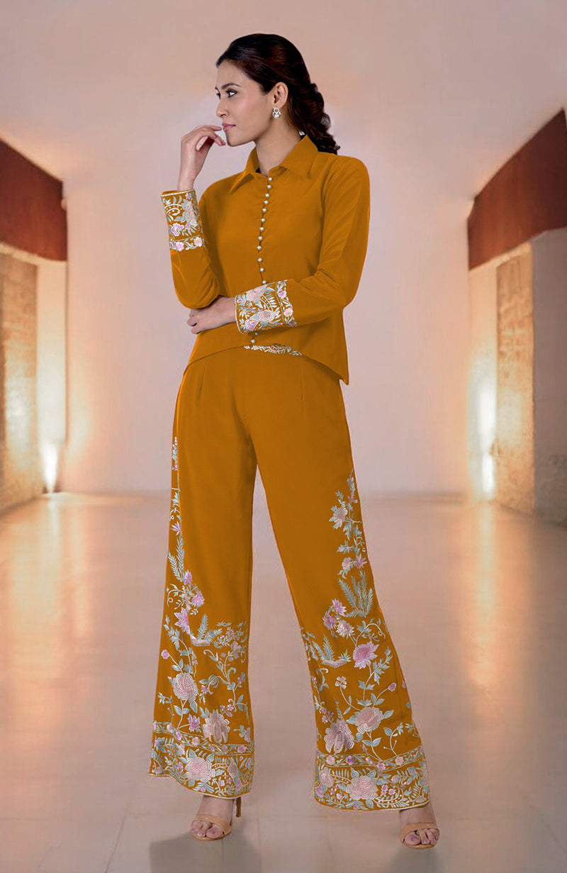 A woman models a Hawthorn Rose Parsi Gara embroidered co-ord set.