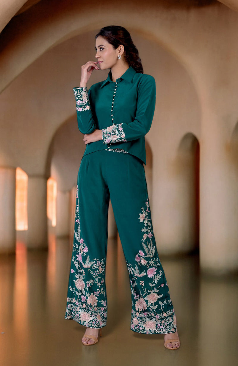 Green Parsi Gara embroidered co-ord set with a high-low shirt and wide-leg pants.