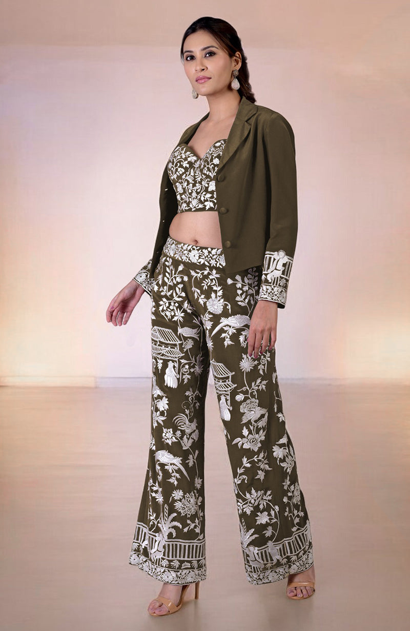 Olive Parsi Gara embroidered co-ord set with a corset, pants, and jacket.