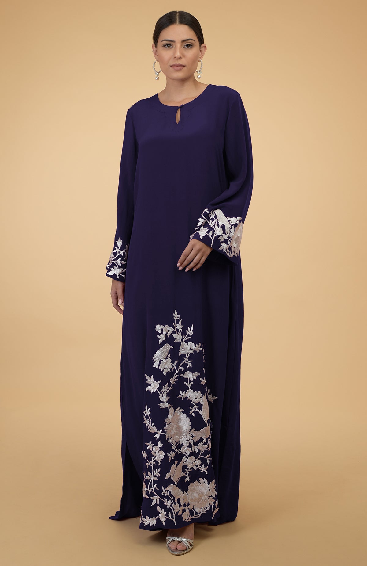 Eclipse blue silk crepe kaftan with floral and bird embroidery.